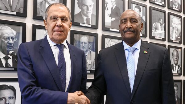 Russian Foreign Minister Sergey Lavrov (left) and Chairman of the Sovereign Council of the Republic of Sudan Abdelfattah Burhan at a meeting at the 77th session of the UN General Assembly in New York. - Sputnik International