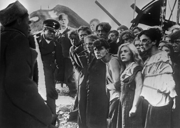A shot from the film &quot;The Young Guard&quot;, directed by Sergei Gerasimov (M. Gorky Film Studio, 1948). The members of the organization were indeed young - more than half of them didn&#x60;t reach 19.Actors (from left to right) Nonna Mordyukova as Ulyana Gromova, Sergei Gurzo as Sergei Tyulenin, Inna Makarova as Lyubov Shevtsova, Georgy Yumatov as Anatoly Popov. - Sputnik International