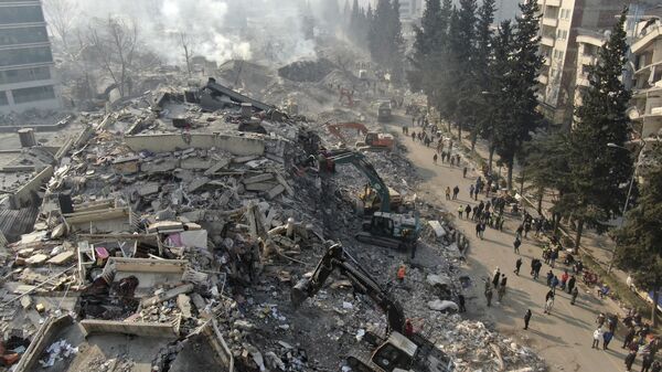 Aerial photo showing collapsed buildings in Kahramanmaras, southern Turkiye, Saturday, Feb. 11, 2023. - Sputnik International