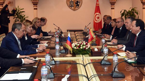 Tunisian Foreign Minister Khemaies Jhinaoui (R) meets with his visiting Russian counterpart Sergey Lavrov (L) during a joint session of talks in the capital Tunis on January 26, 2019.  - Sputnik International