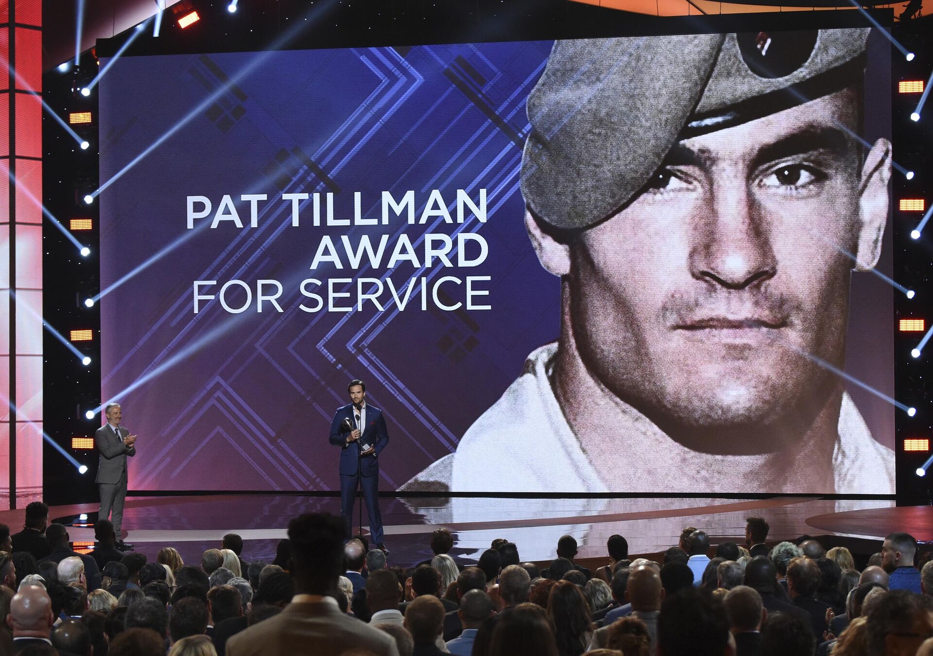 Former Marine Sgt. Jake Wood accepts the Pat Tillman award for service at the ESPY Awards in Los Angeles. Pat's Run annually draws 30,000 people to run in honor former NFL player and soldier Pat Tillman. The coronavirus pandemic forced organizers join several other races in shifting it to a virtual event. (Photo by Phil McCarten/Invision/AP, File) - Sputnik International, 1920, 14.02.2023