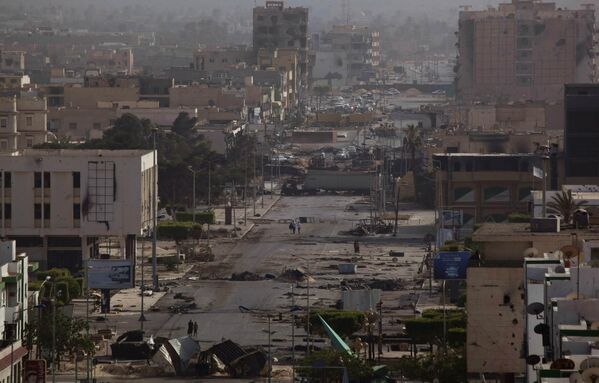 This photo taken on Sunday 22 May 2011, shows a general view of Tripoli street from the terrace of a building used by snipers loyal to Libyan leader Muammar Gaddafi.  - Sputnik International