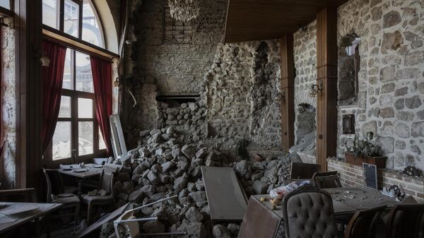 A view of the hall of a hotel destroyed during an earthquake in Antakya, southeastern Turkiye, Monday, February 13, 2023.  - Sputnik International