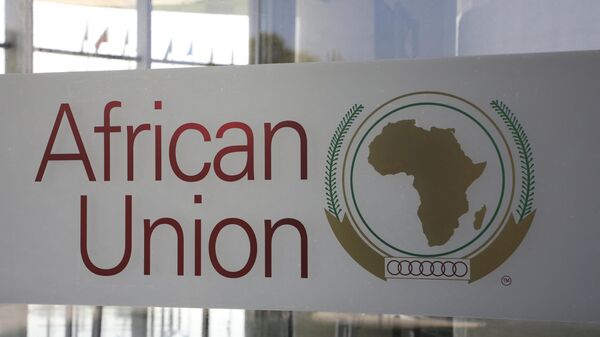 The logo of the African Union (AU) is seen at the entrance of the AU headquarters on March 13, 2019, in Addis Ababa.  - Sputnik International