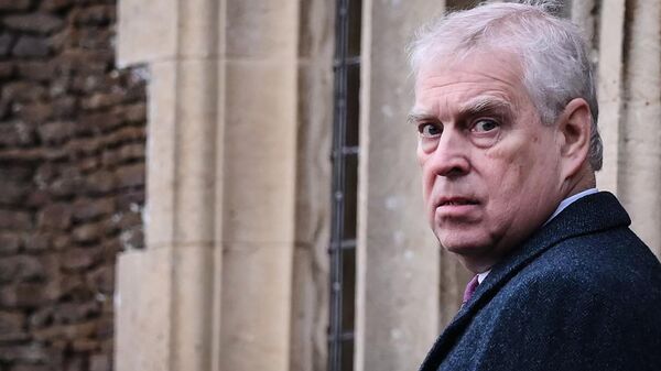 Britain's Prince Andrew, Duke of York reacts as he arrives for the Royal Family's traditional Christmas Day service at St Mary Magdalene Church in Sandringham, Norfolk, eastern England, on December 25, 2022 - Sputnik International