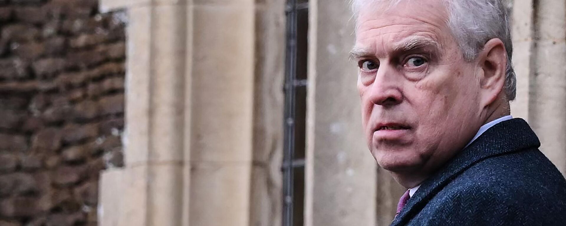 Britain's Prince Andrew, Duke of York reacts as he arrives for the Royal Family's traditional Christmas Day service at St Mary Magdalene Church in Sandringham, Norfolk, eastern England, on December 25, 2022 - Sputnik International, 1920, 19.02.2023