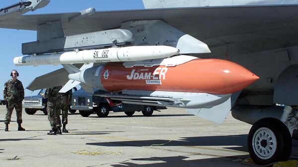 File photo image of a JDAM-ER glide bomb fitted aboard an F-16 Fighting Falcon before a test. - Sputnik International
