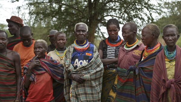 In this photo taken Wednesday, Oct. 18, 2017, Karamojong female elders gather for a discussion in the semi-arid savannah region of Karamoja, in northeastern Uganda.  - Sputnik International