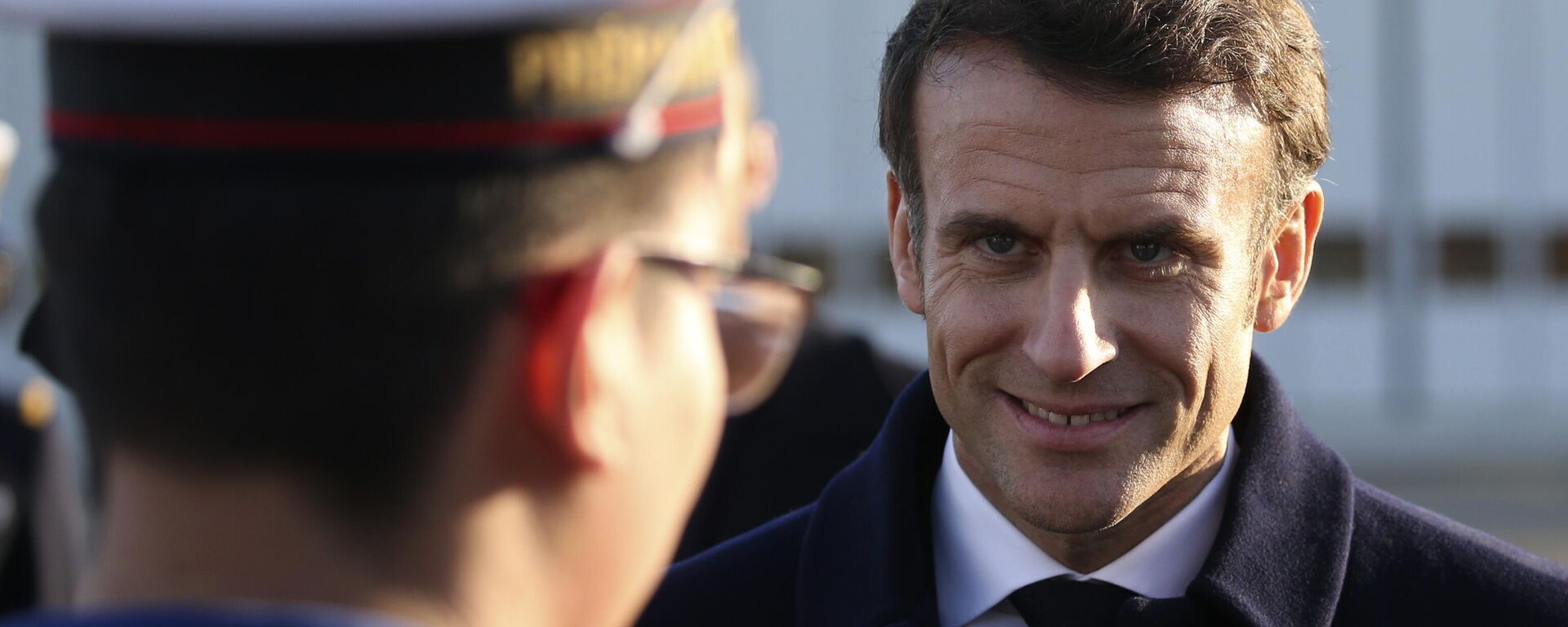 French President Emmanuel Macron smiles to a navy soldier as he visits the Mont-de-Marsan air base, southwestern, Friday, Jan. 20, 2023, France. - Sputnik International, 1920, 28.02.2023