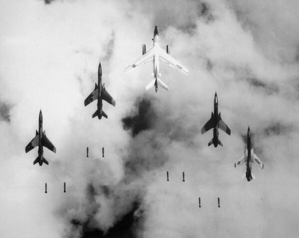 &quot;Flying under radar control with a B-66 Destroyer, Air Force F-105 Thunderchief pilots bomb a military target through low clouds over the southern panhandle of North Vietnam. June 14, 1966.&quot; - Sputnik International