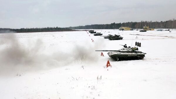 Russian and Belarusian tanks engaging in joint exercises at a range in Belarus. File photo. - Sputnik International