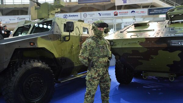 A serviceman attends the 10th International Armament and Military Equipment Fair PARTNER-2021, in Belgrade, Serbia. - Sputnik International