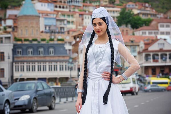 A participant of National Costume Day in Tbilisi, Georgia. - Sputnik International