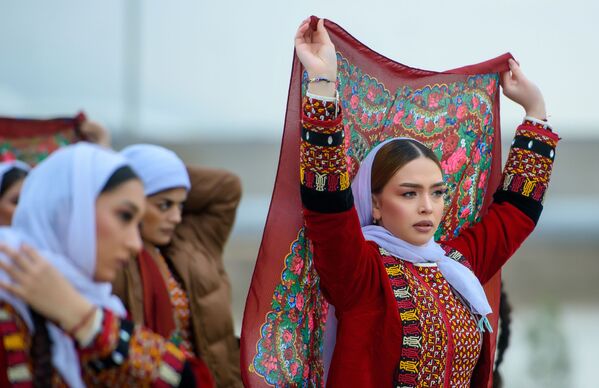 Girls in national costumes during Novruz celebrations in Ashgabat, Turkmenistan.Novruz is a national holiday that marks the beginning of spring.  - Sputnik International