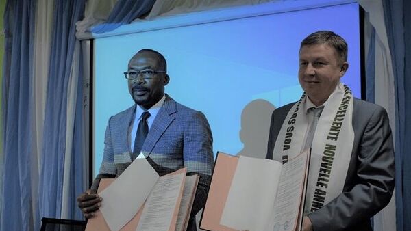 The ceremony of signing the memorandums between Russian Yaroslavl State Pedagogical University named after K.D. Ushinsky (YSPU) and Ivorian ETIC University  - Sputnik International