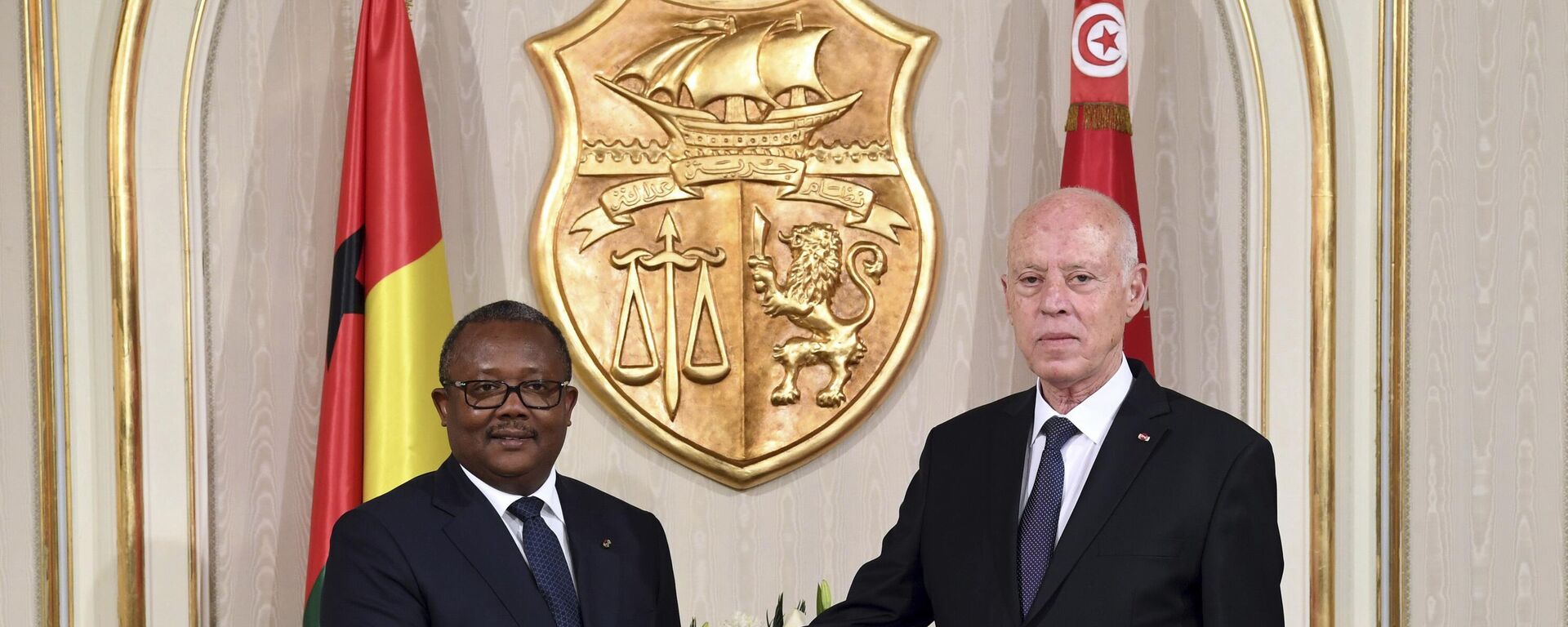 Tunisian President Kais Saied, right, shakes hands with President of Guinea-Bissau Umaro Sissoco Embalo before a meeting in Carthage, near Tunis, Tunisia, Wednesday, March 8, 2023 - Sputnik International, 1920, 09.03.2023