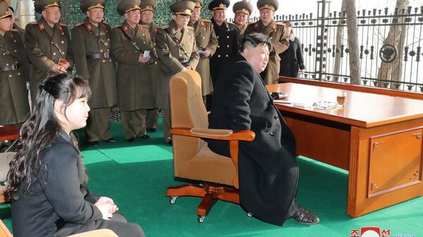 DPRK leader Kim Jong Un, KPA brass, and Kim's daughter watch a rocket artillery drill in Nampo on March 9, 2023. - Sputnik International