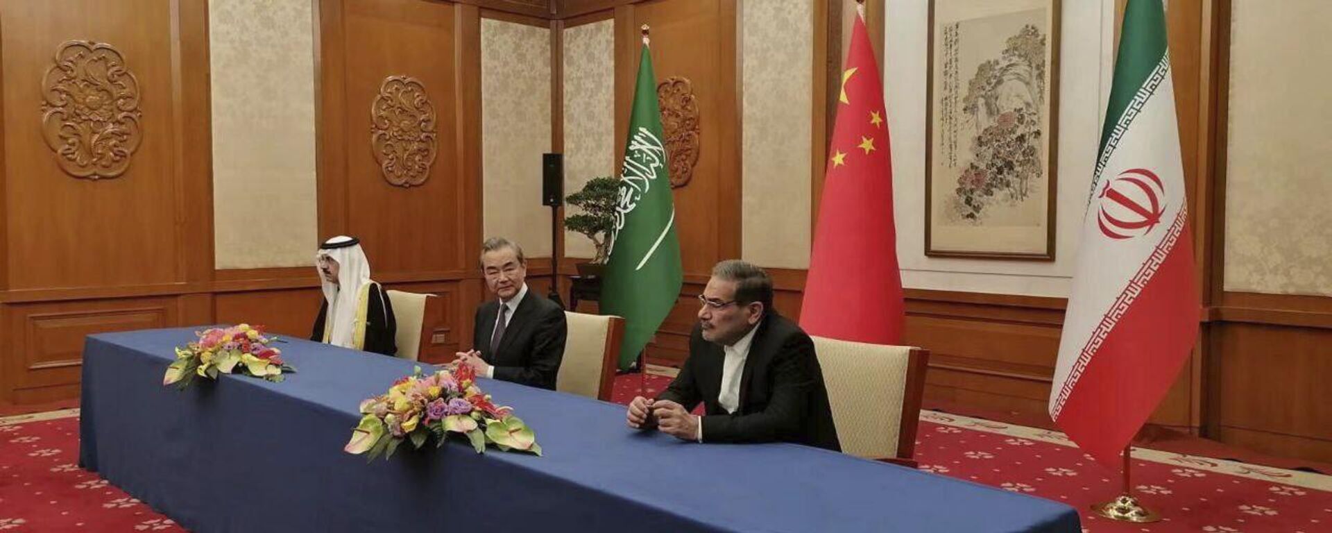 In this photo released by Nournews, Secretary of Iran's Supreme National Security Council, Ali Shamkhani, right, China's most senior diplomat Wang Yi, center, and Saudi Arabia's National Security Adviser Musaad bin Mohammed al-Aiban looks on during an agreement signing ceremony between Iran and Saudi Arabia to reestablish diplomatic relations and reopen embassies after seven years of tensions between the Mideast rivals, in Beijing, China, Friday, March 10, 2023. - Sputnik International, 1920, 07.04.2023
