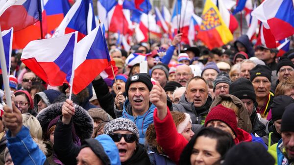 People gather for an anti-government demonstration at the Vencesla's Square in Prague, Czech Republic, Saturday, March 11, 2023. - Sputnik International