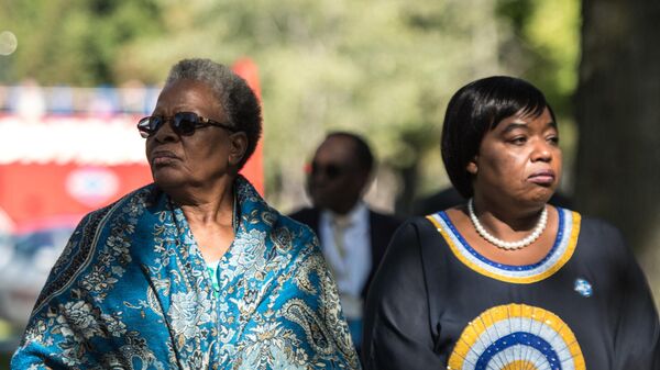 Namibia's Deputy Prime Minister and former Foreign Minister Netumbo Nandi-Ndaitwah (L) and Monica Juma, cabinet secretary for foreign affairs and international trade of Kenya walk to commemorate the victims of gender and sexual-based violence by remembering the Ecole Polytechnique massacre in Montreal, Canada, on September 22, 2018 - Sputnik International