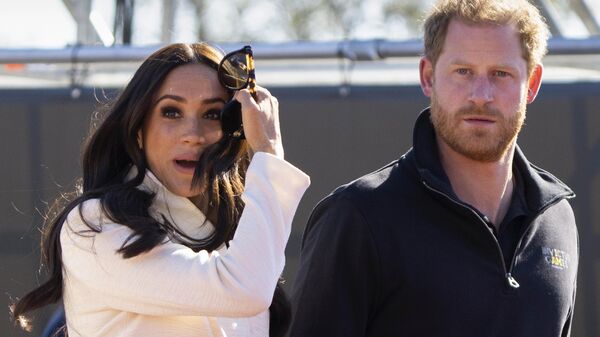 Prince Harry and Meghan Markle, Duke and Duchess of Sussex visit the track and field event at the Invictus Games in The Hague, Netherlands, Sunday, April 17, 2022. Prince Harry and his wife, Meghan, have been asked to vacate their home in Britain. Frogmore Cottage, located on the grounds of Windsor Castle west of London, had been intended as the couple’s main residence before they gave up royal duties and moved to Southern California. - Sputnik International