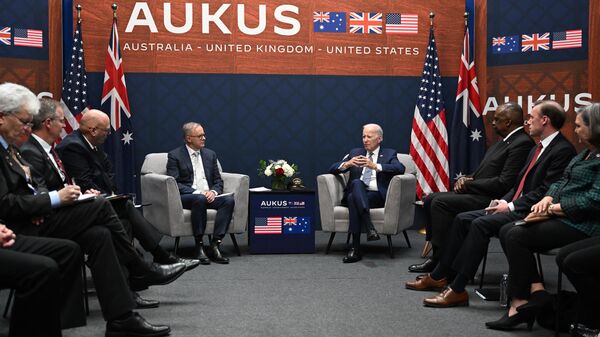 US President Joe Biden (R) meets with Australian Prime Minister Anthony Albanese (L) during the AUKUS summit at Naval Base Point Loma in San Diego California on March 13, 2023 - Sputnik International