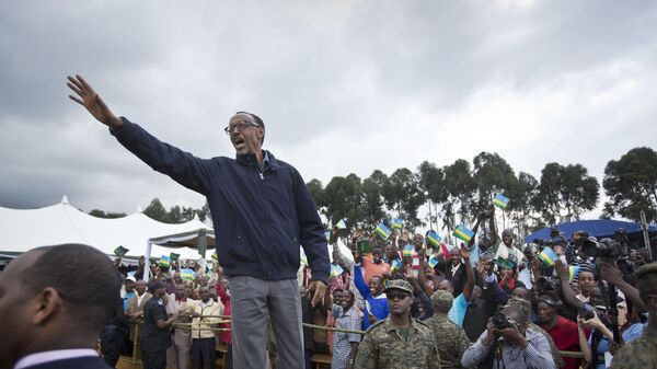 In this Saturday, Sept. 5, 2015 file photo, Rwanda's President Paul Kagame waves to the crowd before speaking at a baby gorilla naming ceremony in Kinigi, northern Rwanda - Sputnik International