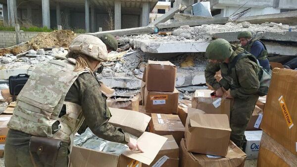 Sputnik distributes humanitarian aid in quake-hit areas of Syria - Sputnik International