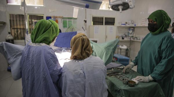 Doctors perform a repair surgery on a fistula patient who had previously undergone female genital mutilation (FGM), at the Edna Adan Maternity Hospital in Hargeisa, Somaliland, a semi-autonomous breakaway region of Somalia, Tuesday, Feb. 8, 2022. - Sputnik International