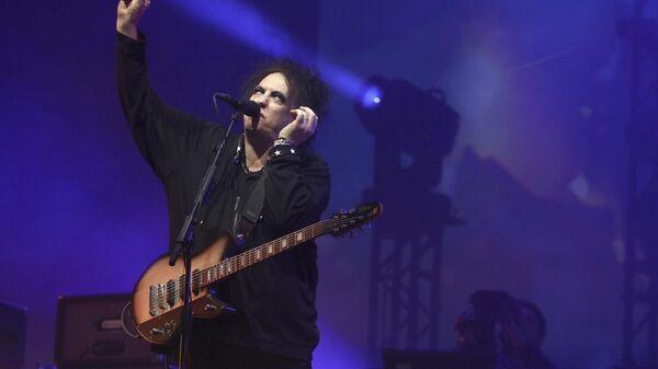 Musician Robert Smith performs with his band The Cure on the Pyramid Stage as they close the final day of the Glastonbury Festival at Worthy Farm, Somerset, England, Sunday, June 30, 2019. - Sputnik International