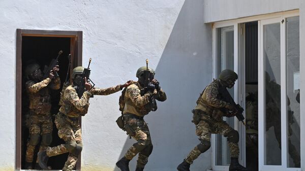 Ivorian special forces take part in the annual US-led Flintlock military training hosted by the Internationl Counter-Terrorism Academy, in Jacqueville, on March 14, 202 - Sputnik International