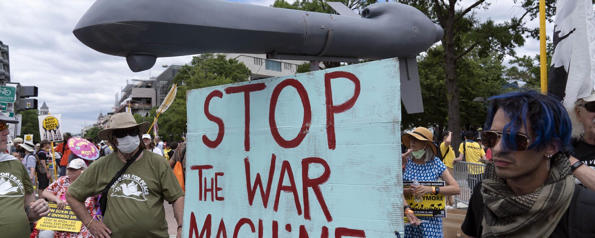 Anti-war demonstrators hold a mock drone as they rally during the Poor People's Campaign, Moral March on Pennsylvania Avenue in Washington, Saturday, June 18, 2022. - Sputnik International, 1920, 20.03.2023