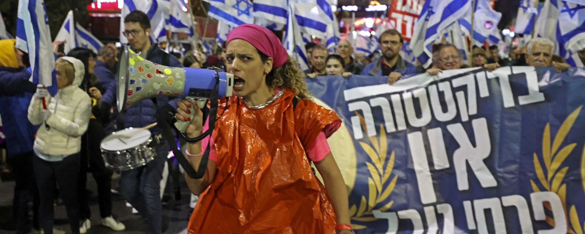 Protesters gather during a rally against the government's controversial judicial overhaul bill in Haifa, Israel on March 18, 2023. - Sputnik International, 1920, 29.03.2023