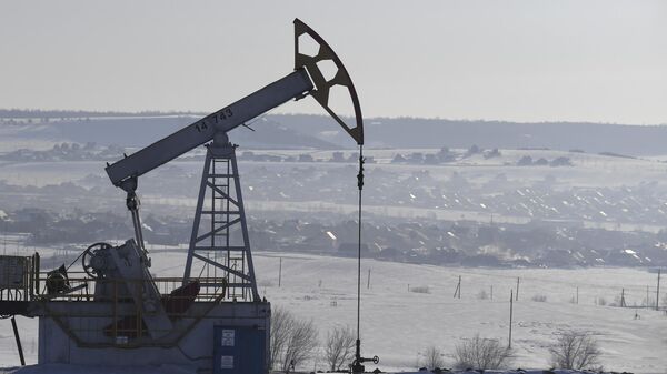 An oil pumpjack is seen in Almetyevsk District, Tatarstan, Russia.  - Sputnik International