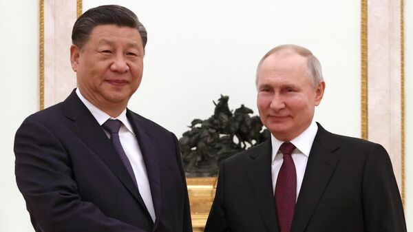 March 20, 2023. Russian President Vladimir Putin and President of the People's Republic of China (PRC) Xi Jinping (left) during a meeting. - Sputnik International