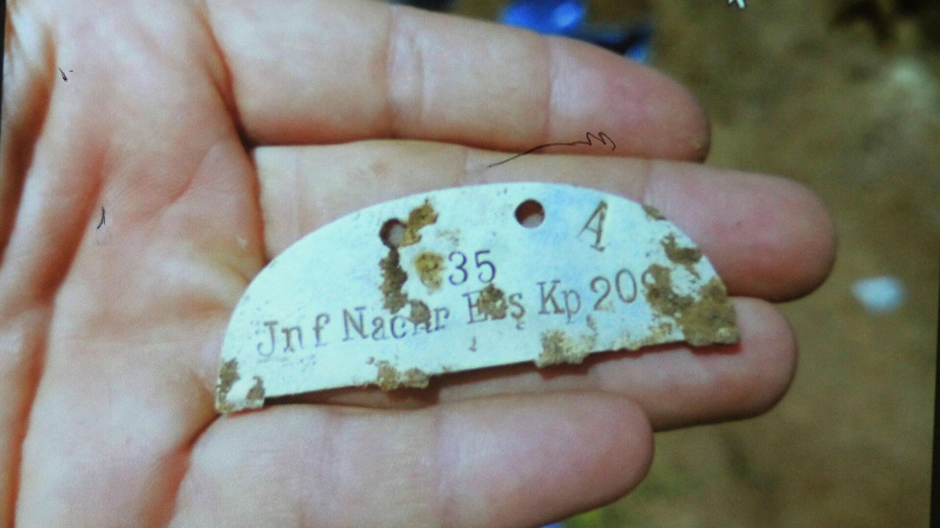 Identification tag of a fallen German soldier - Sputnik International, 1920, 21.03.2023