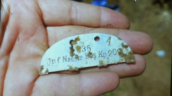 Identification tag of a fallen German soldier - Sputnik International
