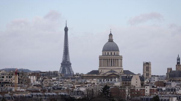 This photograph taken on March 13, 2023, shows the Eiffel tower (L) and the dome of the Pantheon (R) in Paris - Sputnik International