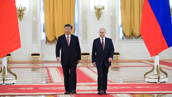 Chinese President Xi Jinping and Russian President Vladimir Putin  - Sputnik International