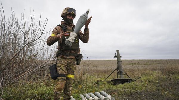 Украинский военный по позиции в Харьковской области - Sputnik International