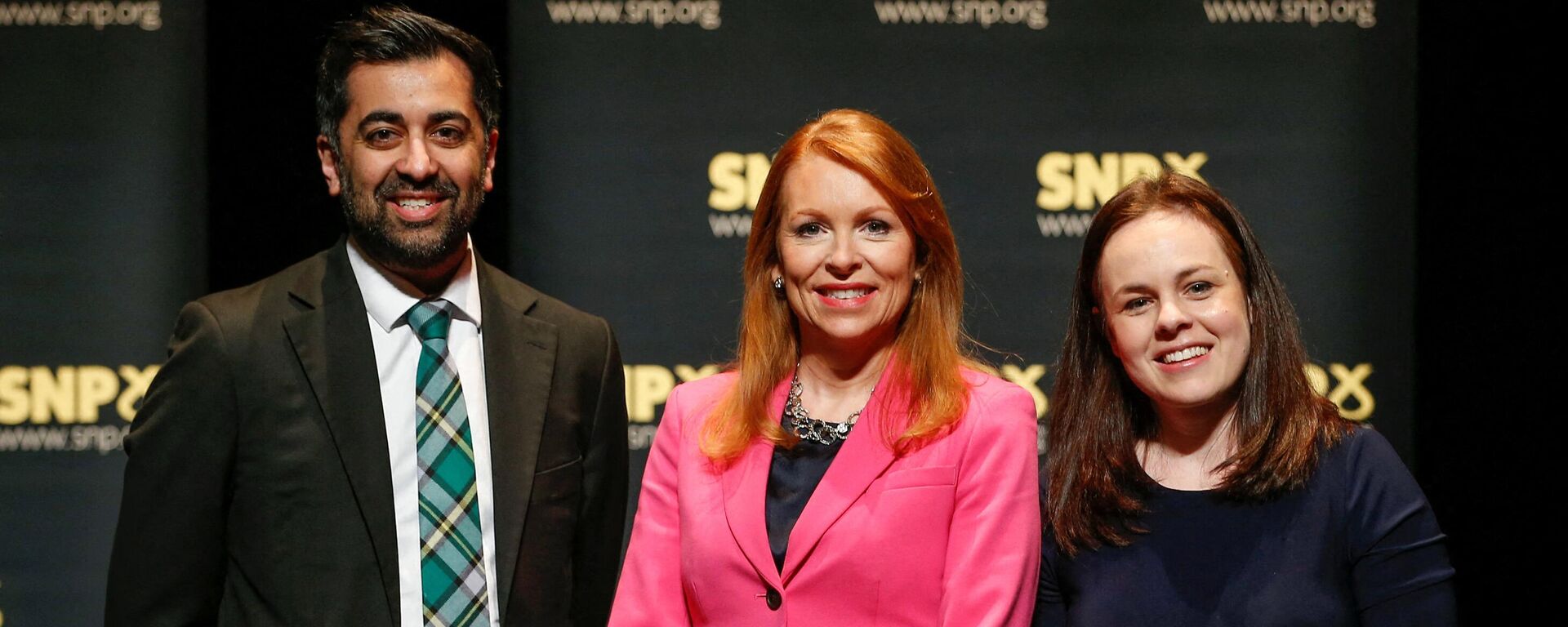 Contenders to become the leader of the Scottish National Party (SNP), and Scotland's First Minister, SNP MSP Ash Regan (C), Scotland's Finance Minister and SNP MSP Kate Forbes (R), and Scotland's Health Minister and SNP MSP Humza Yousaf pose for a photograph at a SNP leadership hustings in Aberdeen on March 12, 2023. - Sputnik International, 1920, 27.03.2023