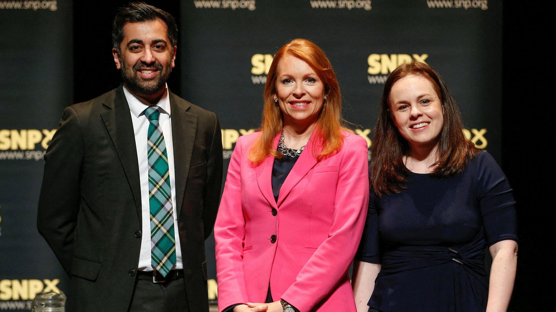 Contenders to become the leader of the Scottish National Party (SNP), and Scotland's First Minister, SNP MSP Ash Regan (C), Scotland's Finance Minister and SNP MSP Kate Forbes (R), and Scotland's Health Minister and SNP MSP Humza Yousaf pose for a photograph at a SNP leadership hustings in Aberdeen on March 12, 2023. - Sputnik International, 1920, 27.03.2023