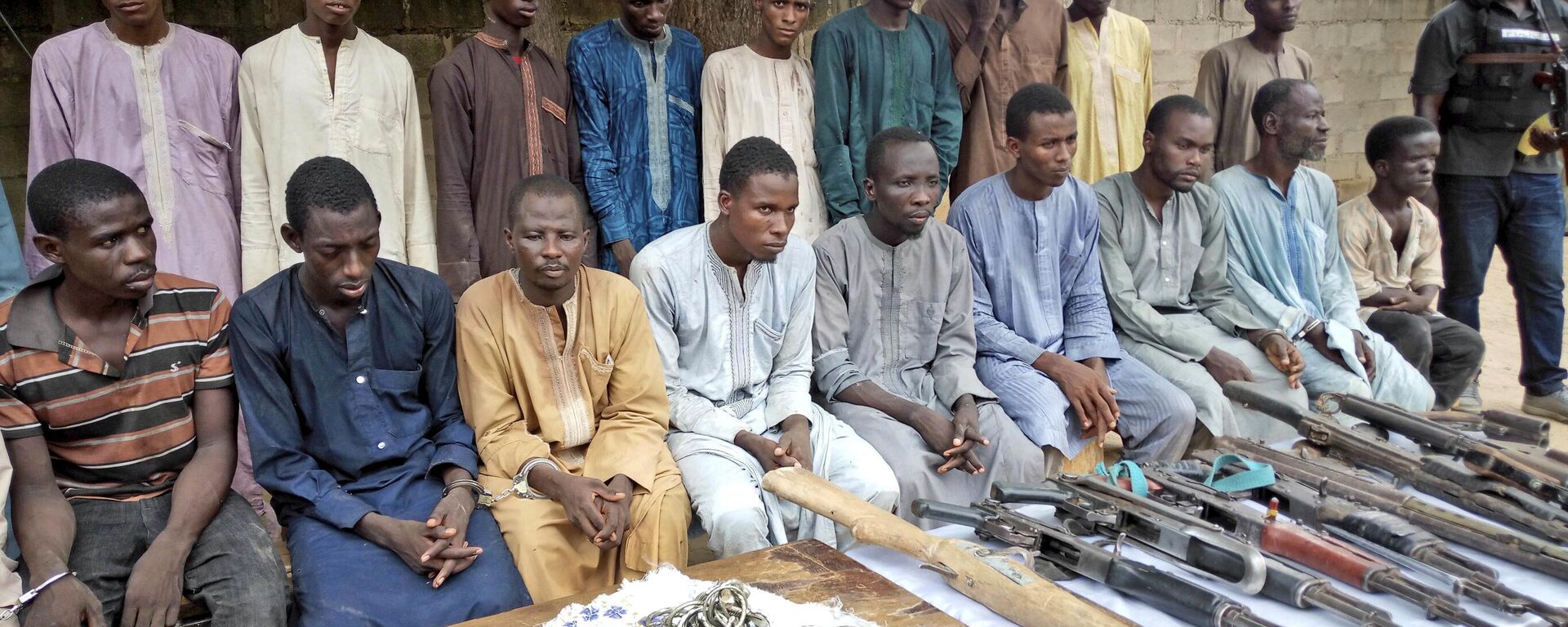 In this Wednesday July.18, 2018 file photo, A group of men identified by Nigerian police as Boko Haram extremist fighters and leaders are shown to the media, in Maiduguri, Nigeria.  - Sputnik International, 1920, 28.03.2023