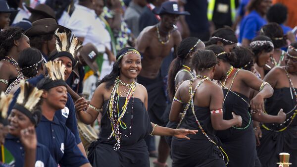 Dancers rehearse at a departure ceremony ahead of the arrival of U.S. President Barack Obama and First Lady Michelle Obama at the end of the final leg of their weeklong visit to Africa, at the Julius Nyerere airport in Dar es Salaam, Tanzania Tuesday, July 2, 2013.  - Sputnik International