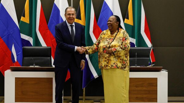 Russian Minister of Foreign Affairs of Sergei Lavrov (L) shakes hands with South African Minister of International Relations and Cooperation Naledi Pandor (R) during a press conference following their meeting at the OR Tambo Building in Pretoria on January 23, 2023.  - Sputnik International