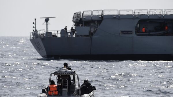 Nigerian special forces sail to intercept pirates during a joint exercise between Nigerian and Moroccan naval personels as part of Obangame Express, a multinational maritime exercise involving 33 countries off the coast of Lagos on March 20, 2019 - Sputnik International