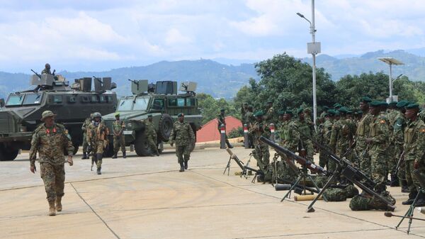 The flagging-off of the Uganda Peoples’ Defence Forces Contingent to serve under the East African Community Regional Force (EACRF) in the Eastern Democratic Republic of Congo - Sputnik International