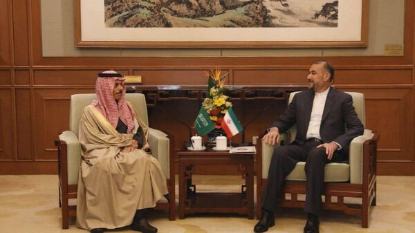 Saudi Foreign Minister Faisal bin Farhan Al-Saud and his Iranian counterpart, Hossein Amirabdollahian, meet in Beijing, April 6, 2023 - Sputnik International