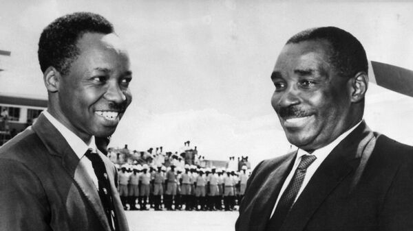 President Abeid Amani Karume of Zanzibar, right, is welcomed by President Julius Nyerere of Tanganyika on his arrival at Dar-Es-Salaam airport, Tanzania on April 27, 1964. - Sputnik International