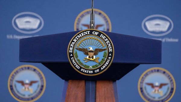 The Department of Defense Seal is seen on the podium before Pentagon spokesman U.S. Air Force Brig. Gen. Patrick Ryder speaks during a media briefing at the Pentagon, Friday, Feb. 24, 2023, in Washington. - Sputnik International